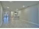 Open-concept living area with tile flooring and recessed lighting perfect for entertaining at 4639 Grandview Glen Dr, Auburndale, FL 33823