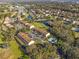 Aerial view of condo community near a pond at 6123 Topher Trl # 63C, Mulberry, FL 33860