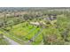Expansive property featuring a beautiful home, pond, large lot, and private wooded setting at 9240 Moore Rd, Lakeland, FL 33809
