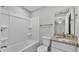 Bathroom with shower/tub combo and granite vanity at 110 5Th Sw St, Fort Meade, FL 33841