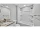 Clean bathroom with tub, shower, and granite vanity at 110 5Th Sw St, Fort Meade, FL 33841