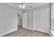 Bright bedroom with wood-look floors and ceiling fan at 110 5Th Sw St, Fort Meade, FL 33841