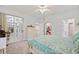 Main bedroom with access to the bathroom and walk-in closet at 202 Golf Aire Blvd, Winter Haven, FL 33884