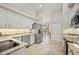 Kitchen with granite countertops and stainless steel appliances at 202 Golf Aire Blvd, Winter Haven, FL 33884