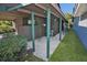 A carport is attached to the house providing covered parking at 3597 Raintree Ln, Lakeland, FL 33803