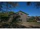 Home exterior with modern architectural details and lush surrounding greenery at 3597 Raintree Ln, Lakeland, FL 33803