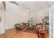 Cozy living room featuring hardwood floors and comfortable seating arrangements at 3597 Raintree Ln, Lakeland, FL 33803