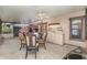 Screened patio with sink/cabinets, table, and hot tub at 3597 Raintree Ln, Lakeland, FL 33803