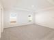Spacious bedroom featuring plush carpet and ample natural light at 468 Ituna Cir, Winter Haven, FL 33881