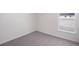 Cozy bedroom with plush carpet and bright natural light at 468 Ituna Cir, Winter Haven, FL 33881