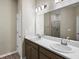 Bathroom featuring double sinks, ample counter space, and a shower at 723 Bentley North Loop, Auburndale, FL 33823