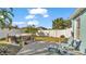 Secluded backyard features a private hot tub, patio with seating, and manicured landscaping for a tranquil retreat at 7525 Jessamine Dr, Lakeland, FL 33810