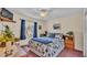 Charming bedroom featuring natural light, calming decor, and cozy furnishings at 7525 Jessamine Dr, Lakeland, FL 33810