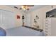 Calm bedroom featuring a ceiling fan, closet, and soothing decor at 7525 Jessamine Dr, Lakeland, FL 33810