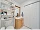 Small bathroom with toilet, sink, and storage at 1323 Valley E Hl, Lakeland, FL 33813