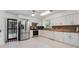 Spacious kitchen with white cabinets, stainless steel appliances, and granite countertops at 1323 Valley E Hl, Lakeland, FL 33813
