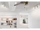 Open living room with built-in shelves and views of a light-filled space with fan at 1323 Valley E Hl, Lakeland, FL 33813