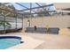 Poolside oasis featuring colorful seahorse statues and surrounding patio space at 1323 Valley E Hl, Lakeland, FL 33813
