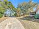 Backyard featuring a view of the lake and the property's serene setting at 309 W Frederick Ave, Dundee, FL 33838