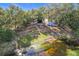 A view of the backyard and the tranquil pond, showcasing the property's peaceful setting at 309 W Frederick Ave, Dundee, FL 33838