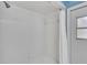 Bathroom shower with white tiles at 3845 Garnet Dr, Mulberry, FL 33860