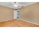 Spacious bedroom with hardwood floors and neutral walls at 3845 Garnet Dr, Mulberry, FL 33860