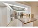 Contemporary kitchen featuring stainless steel appliances, a breakfast bar, and ample counter space at 3845 Garnet Dr, Mulberry, FL 33860