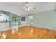 Open living room with access to pool via sliding glass door at 3845 Garnet Dr, Mulberry, FL 33860
