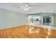 Open living space with hardwood floors and access to the kitchen at 3845 Garnet Dr, Mulberry, FL 33860