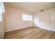This room features wood-look floors, and a closet for ample storage at 561 Cameo Dr, Lakeland, FL 33803