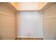 A walk-in closet features metal shelving for organized storage space at 561 Cameo Dr, Lakeland, FL 33803