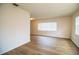 The sunny living room has updated flooring and is ready for a new owner at 561 Cameo Dr, Lakeland, FL 33803