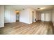 The spacious living room is full of light, and features updated flooring at 561 Cameo Dr, Lakeland, FL 33803