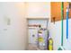 The utility room has an A.O. Smith water heater at 561 Cameo Dr, Lakeland, FL 33803