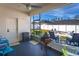 Screened patio with backyard view, grill, and seating at 185 St Thomas Dr, Mulberry, FL 33860