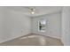 Spacious bedroom with tile flooring and large window at 3107 Valley High Dr, Lakeland, FL 33813