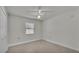 Bright bedroom with tile flooring and ceiling fan at 3107 Valley High Dr, Lakeland, FL 33813