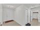 Bright and airy entryway with tile flooring and access to laundry at 3107 Valley High Dr, Lakeland, FL 33813