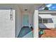 Inviting front entrance with a light teal door and walkway at 3107 Valley High Dr, Lakeland, FL 33813