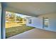 Covered patio overlooking backyard at 4036 Tullamore Ln, Auburndale, FL 33823