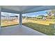 Backyard with covered patio at 4036 Tullamore Ln, Auburndale, FL 33823