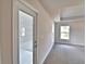 Bright bedroom with neutral walls, large window and plush carpet at 4036 Tullamore Ln, Auburndale, FL 33823