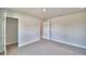 This bedroom features carpet, a closet, and neutral walls at 4036 Tullamore Ln, Auburndale, FL 33823