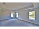 Bedroom with lots of natural light and carpet flooring at 4036 Tullamore Ln, Auburndale, FL 33823