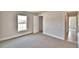 This bedroom features carpet, a window, a closet, and neutral walls at 4036 Tullamore Ln, Auburndale, FL 33823