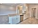 This kitchen has granite countertops, stainless steel dishwasher, and a breakfast bar at 4036 Tullamore Ln, Auburndale, FL 33823