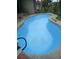 A refreshing light-blue in-ground pool, perfect for enjoying sunny days and backyard fun at 5635 Canvasback Ct, Lakeland, FL 33805