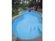 A clean, bright blue swimming pool with surrounding patio, ready for outdoor relaxation and entertainment at 5635 Canvasback Ct, Lakeland, FL 33805