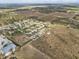 Extensive aerial view showcasing residential homes and lush greenery, providing a unique perspective of the community at 1155 Towergate Cir, Lake Wales, FL 33853