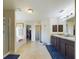 Bright bathroom features double vanities, soaking tub, and separate shower with tile floors at 1155 Towergate Cir, Lake Wales, FL 33853